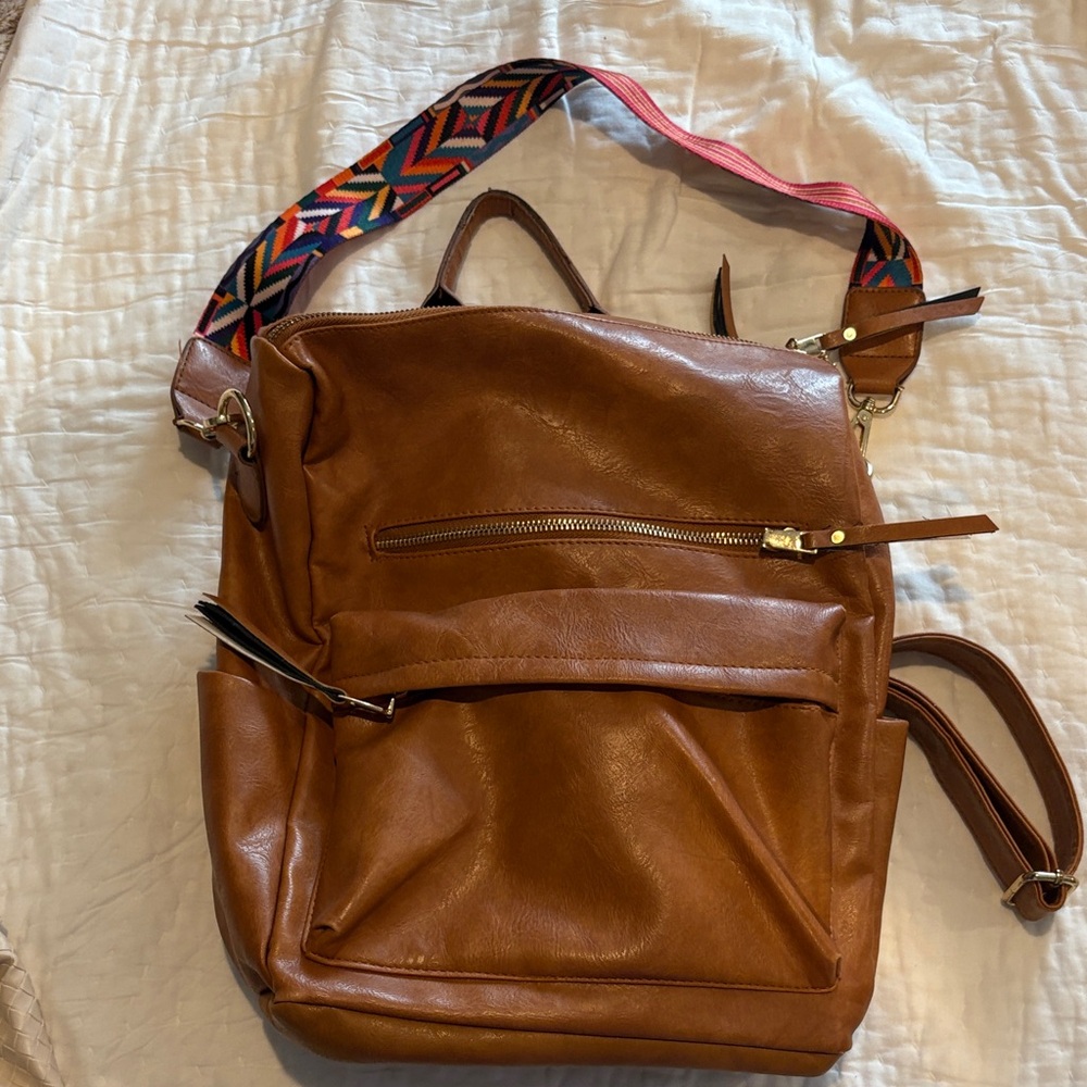 Elegant Tan Leather Women's Backpack with Patterned Strap
